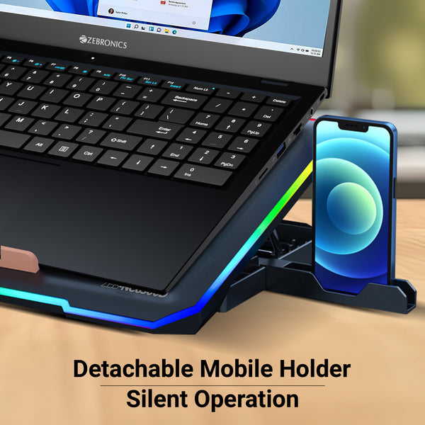 Gaming laptop on Zebronics NC6500D cooling pad showing RGB lighting effects